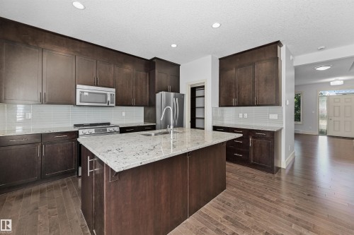 7506 May Common, Edmonton, AB - Indoor Photo Showing Kitchen With Double Sink With Upgraded Kitchen