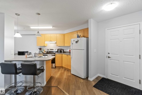 203 636 Mcallister Loop, Edmonton, AB - Indoor Photo Showing Kitchen With Double Sink