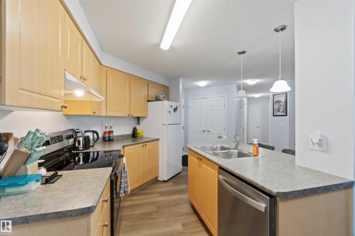 203 636 Mcallister Loop, Edmonton, AB - Indoor Photo Showing Kitchen With Double Sink