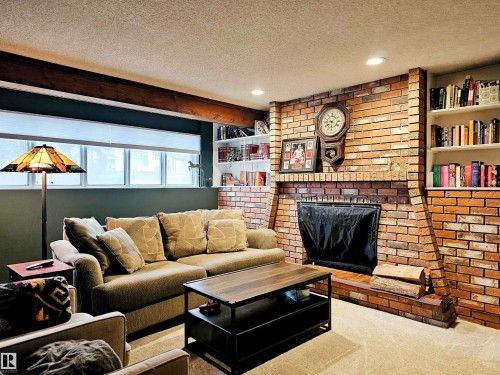 127 Grand Meadow Crescent, Edmonton, AB - Indoor Photo Showing Living Room With Fireplace