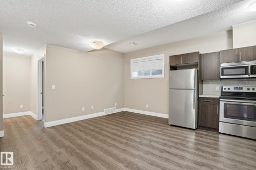 130 Harvest Ridge Drive, Spruce Grove, AB - Indoor Photo Showing Kitchen With Stainless Steel Kitchen