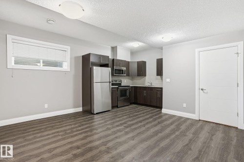 130 Harvest Ridge Drive, Spruce Grove, AB - Indoor Photo Showing Kitchen With Stainless Steel Kitchen
