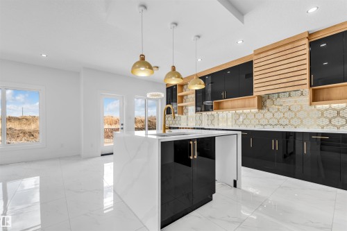 451 Crystal Creek Link, Leduc, AB - Indoor Photo Showing Kitchen With Upgraded Kitchen