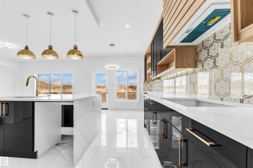 451 Crystal Creek Link, Leduc, AB - Indoor Photo Showing Kitchen With Upgraded Kitchen