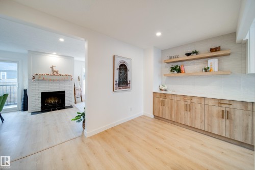 475 Dunluce Road, Edmonton, AB - Indoor Photo Showing Living Room With Fireplace