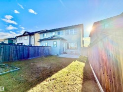 Back of house with a patio and a fenced backyard - 