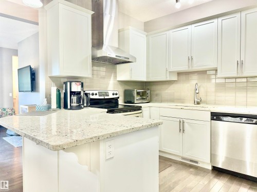 7114 174 Avenue, Edmonton, AB - Indoor Photo Showing Kitchen With Stainless Steel Kitchen With Upgraded Kitchen