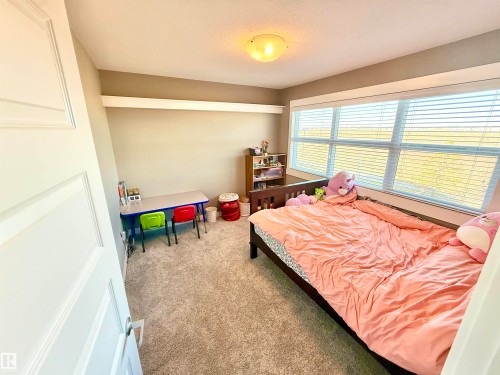7114 174 Avenue, Edmonton, AB - Indoor Photo Showing Bedroom