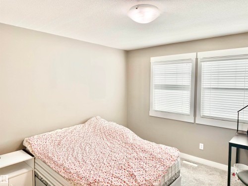 7114 174 Avenue, Edmonton, AB - Indoor Photo Showing Bedroom