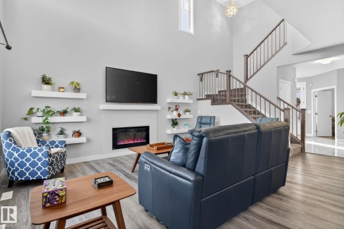 4301 38A Street, Beaumont, AB - Indoor With Fireplace