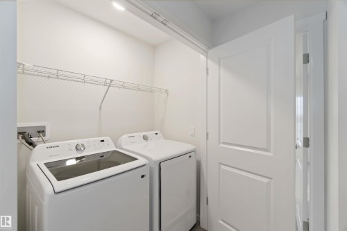 4275 Kinglet Drive Nw, Edmonton, AB - Indoor Photo Showing Laundry Room