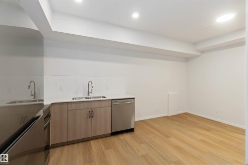 4275 Kinglet Drive Nw, Edmonton, AB - Indoor Photo Showing Kitchen With Double Sink