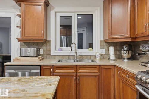 26 Mckay Close, Leduc, AB - Indoor Photo Showing Kitchen With Double Sink