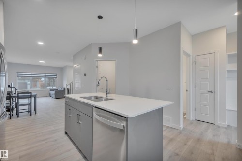 3323 Erlanger Bend, Edmonton, AB - Indoor Photo Showing Kitchen With Double Sink