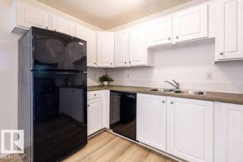52 10208 113 Street, Edmonton, AB - Indoor Photo Showing Kitchen With Double Sink