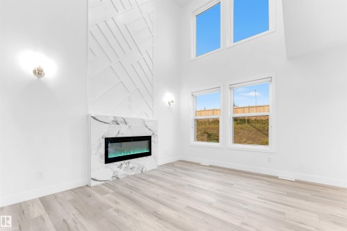 60 Hemingway Crescent, Spruce Grove, AB - Indoor Photo Showing Living Room With Fireplace