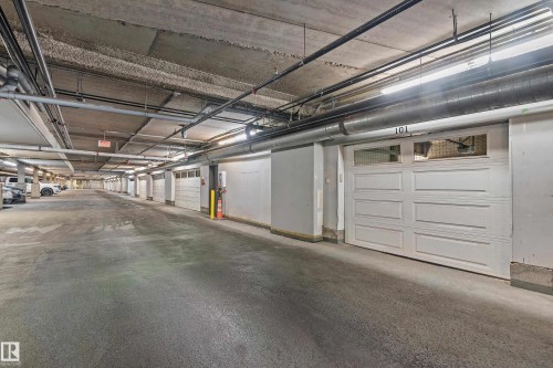 101 5151 Windermere Boulevard, Edmonton, AB - Indoor Photo Showing Garage