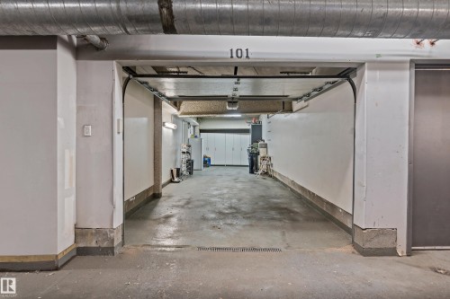 101 5151 Windermere Boulevard, Edmonton, AB - Indoor Photo Showing Garage