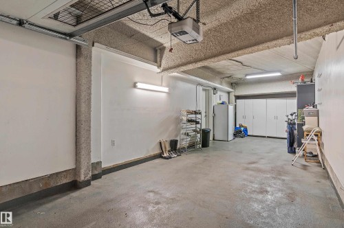 101 5151 Windermere Boulevard, Edmonton, AB - Indoor Photo Showing Garage