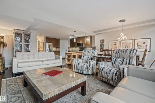 101 5151 Windermere Boulevard, Edmonton, AB - Indoor Photo Showing Living Room
