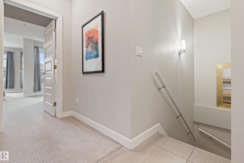 101 5151 Windermere Boulevard, Edmonton, AB - Indoor Photo Showing Other Room