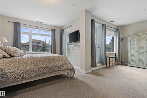 101 5151 Windermere Boulevard, Edmonton, AB - Indoor Photo Showing Bedroom
