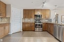 101 5151 Windermere Boulevard, Edmonton, AB  - Indoor Photo Showing Kitchen 