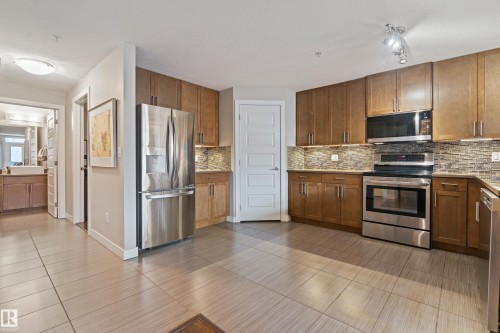 101 5151 Windermere Boulevard, Edmonton, AB - Indoor Photo Showing Kitchen