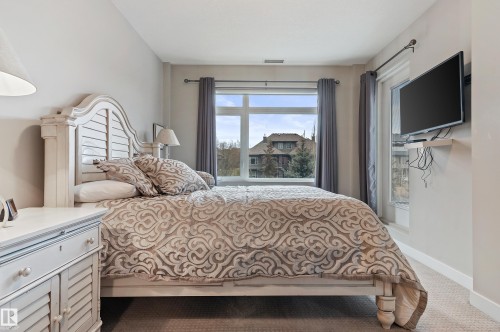 101 5151 Windermere Boulevard, Edmonton, AB - Indoor Photo Showing Bedroom