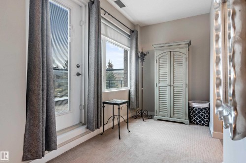 101 5151 Windermere Boulevard, Edmonton, AB - Indoor Photo Showing Other Room