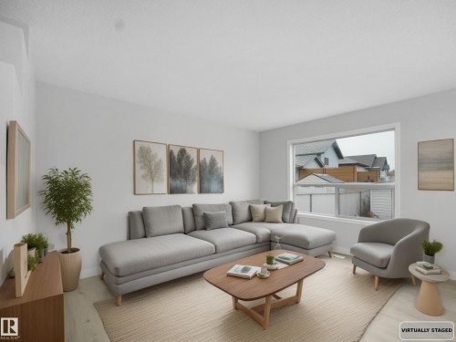 26 16933 115 Street, Edmonton, AB - Indoor Photo Showing Living Room