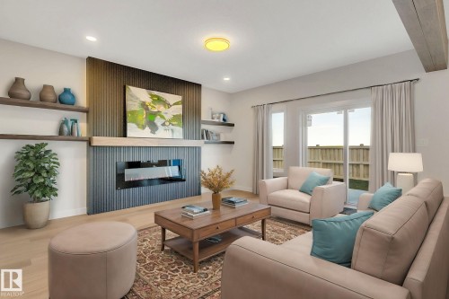 28 Eldridge Point(E), St. Albert, AB - Indoor Photo Showing Living Room With Fireplace