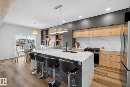28 Eldridge Point(E), St. Albert, AB - Indoor Photo Showing Kitchen With Stainless Steel Kitchen With Double Sink With Upgraded Kitchen