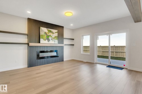 28 Eldridge Point(E), St. Albert, AB - Indoor Photo Showing Living Room With Fireplace