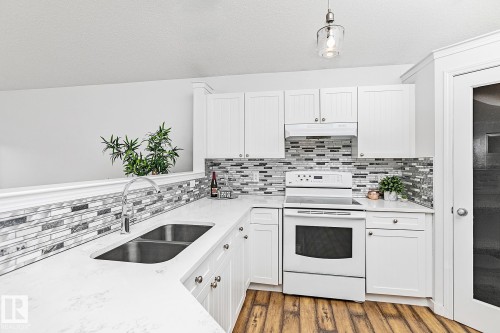 7822 Schmid Place, Edmonton, AB - Indoor Photo Showing Kitchen With Double Sink
