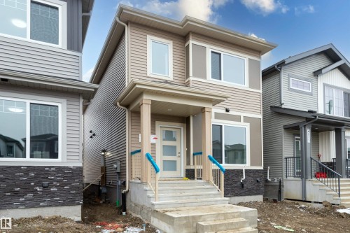 4113 67 Street, Beaumont, AB - Outdoor With Facade
