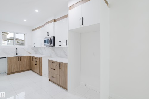 4113 67 Street, Beaumont, AB - Indoor Photo Showing Kitchen