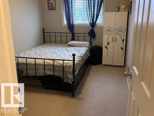 1 230 Edwards Drive Sw, Edmonton, AB - Indoor Photo Showing Bedroom