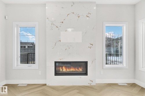 221 Kettyl Court, Leduc, AB - Indoor With Fireplace
