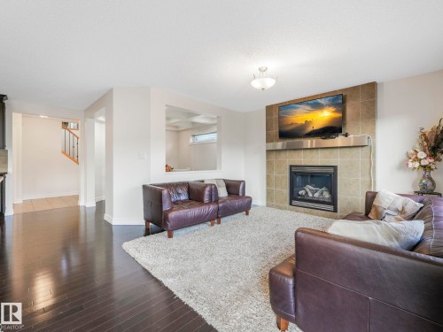2651 Anderson Crescent, Edmonton, AB - Indoor Photo Showing Living Room With Fireplace