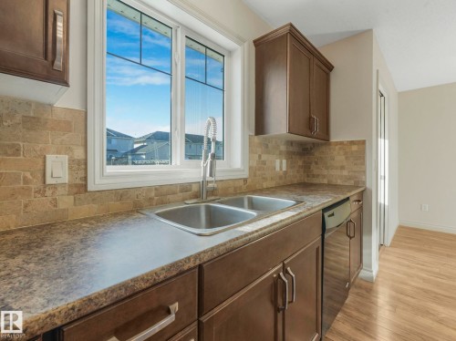 3003 16 Avenue, Edmonton, AB - Indoor Photo Showing Kitchen With Double Sink