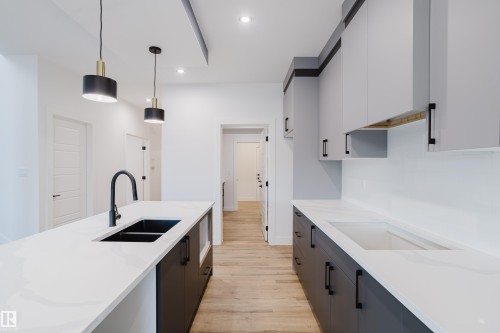 49 Renwyck Place, Spruce Grove, AB - Indoor Photo Showing Kitchen With Double Sink With Upgraded Kitchen