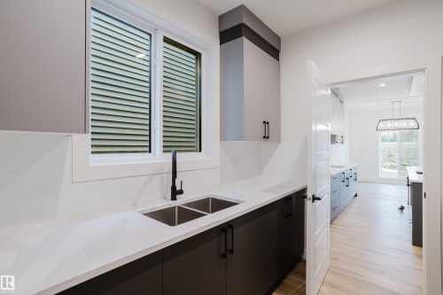 49 Renwyck Place, Spruce Grove, AB - Indoor Photo Showing Kitchen With Double Sink