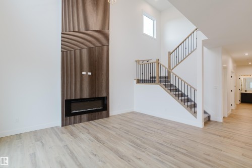 49 Renwyck Place, Spruce Grove, AB - Indoor Photo Showing Other Room With Fireplace