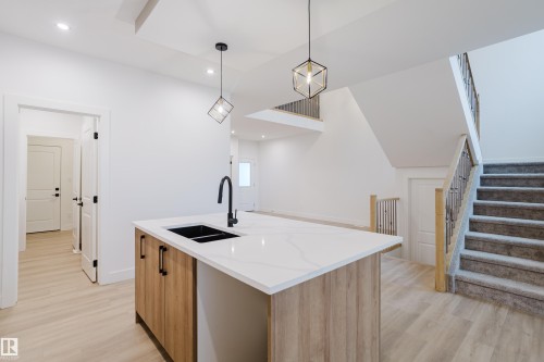 1568 Siskin Link, Edmonton, AB - Indoor Photo Showing Kitchen With Double Sink