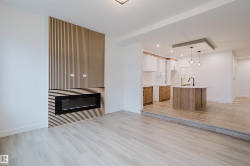 1568 Siskin Link, Edmonton, AB - Indoor Photo Showing Living Room With Fireplace