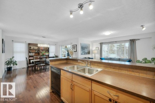 7620 11 Avenue, Edmonton, AB - Indoor Photo Showing Kitchen With Double Sink
