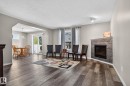 3811 Mclean Close, Edmonton, AB  - Indoor Photo Showing Living Room With Fireplace 