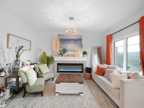 7256 Chivers Place, Edmonton, AB - Indoor Photo Showing Living Room With Fireplace