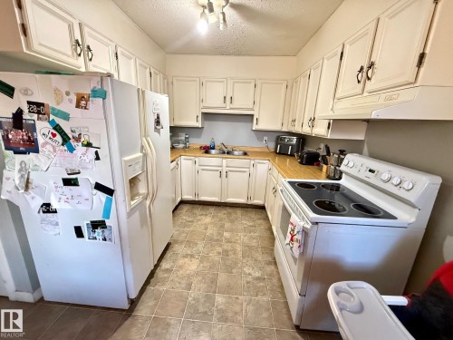 10307 150 Street, Edmonton, AB - Indoor Photo Showing Kitchen With Double Sink